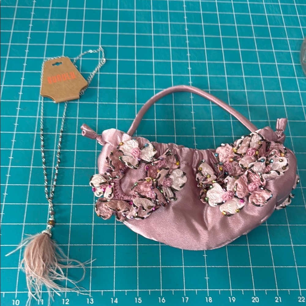 Bunulu Baby Pink Feather Necklace & Unbranded Pink Satin Formal Drawstring Bag